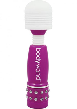 The New & Improved Bodywand Mini Wands are perfect for travel and on-the-go delights. Measuring just 4 inches tall, these wands were engineered for strong and continuous stimulation. Powered by a single AAA battery (included) which allows for a longer run time, and operated by a simple turn on the bottom.